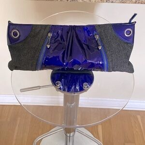 Lollipops  brand denim and vinyl blue clutch. Sweet heart logo zip pulls.